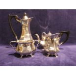 A George VI Art Deco silver Four Piece Tea Service, tapering octagonal form with hinged lids to