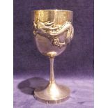 An early 20th century Chinese Silver Goblet by Wang Hing, U shape body embossed with a Dragon, plain