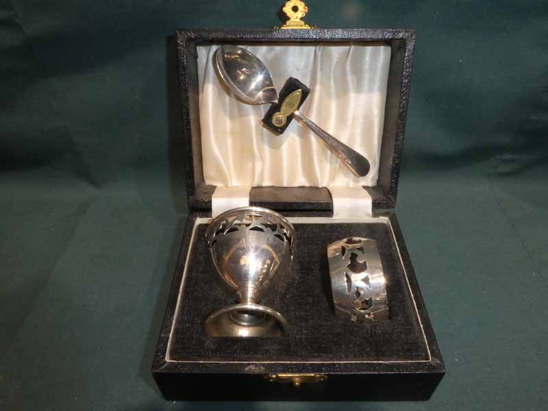 An early 20th century silver plated three-piece Christening set in fitted case