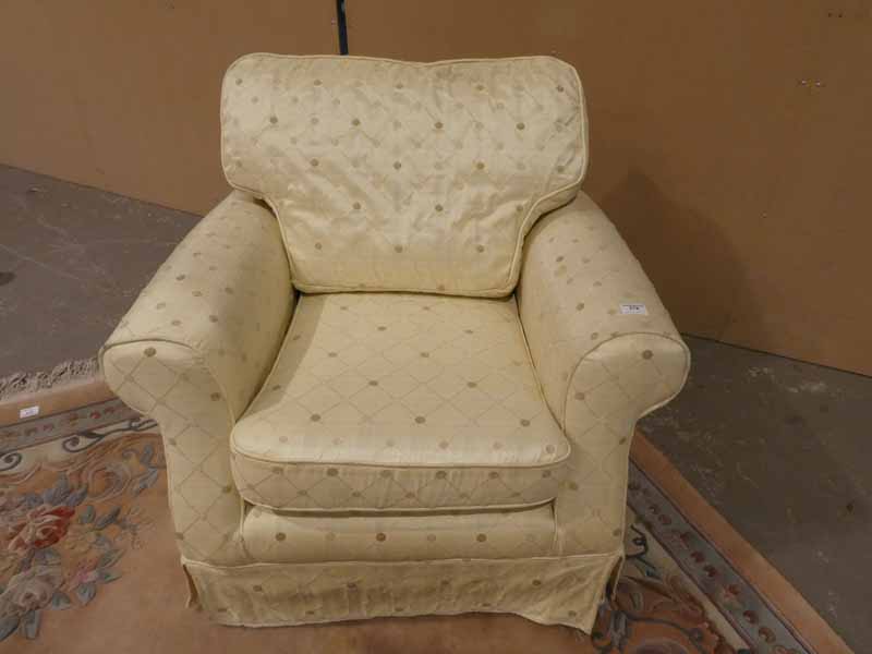 A modern cream upholstered Easy Chair, silk effect upholstery with a diamond pattern