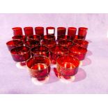 Seven Ruby Glass Drinking Glasses & sixteen similar Sundae Dishes