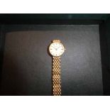 An Empress 9ct gold cased Ladies Wrist Watch with 9ct gold bracelet, 19.7g gross weight