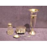 A silver oval four footed Lidded Box, silver Coffee Spoon, silver Bud Vase and small silver lidded