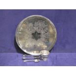 A circular silver plated Tray, plated Sugar Nips, Spoon and miniature Rose Bowl