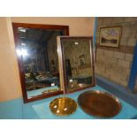 A large Copper Plaque and a Brass Plaque and two rectangular framed Wall Mirrors