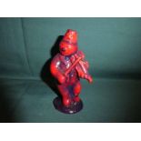 A Royal Doulton Snowman Violinist in rare flambe glaze, Not Produced for Sale, 13.5cm high