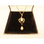 An articulated 9ct gold and white opal pendant on belcher chain necklace, 11.5g (teardrop pendant