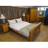 A modern Shaker style oak effect six piece Bedroom Suite comprising a King size bed with open spar