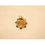 A 9ct gold amethyst cabochon mounted picture frame locket, 7.5g