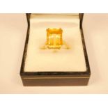 A 9ct gold emerald cut dress ring, the stone table, 14.1 X 10.3mm size P 1/2 5.6g
