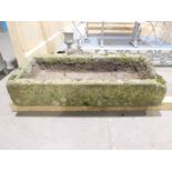 A genuine Stone Trough, rectangular form, slopes from back to front, 96cm long by 40cm wide