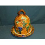 A large Majolica style Cheese Bell and Stand in the form of a Bee Skep, 38cm high