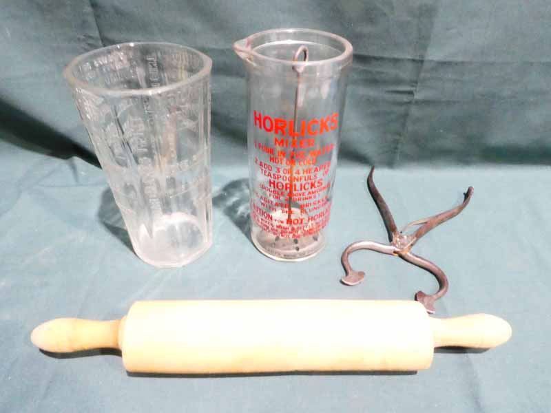 A one pint Horlicks Mixer, a vintage glass Liquid Measure, a wooden Rolling Pin and a pair of