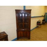 A Georgian style reproduction mahogany Display Cabinet, convex form dentil frieze, a pair of