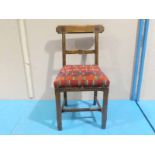 An Arts and Crafts oak Ecclesiastical style Chair in the manner of Pugin straight back rail,