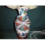 A Chinese style polychrome decorated baluster shape Vase converted to a Table Lamp base, 40cm