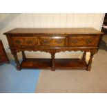 A good reproduction oak 18th century style Pot Board Dresser Base, moulded edge rectangular top over