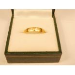 A 9ct gold decahedral wedding band with incise decoration, size N, 2.6g