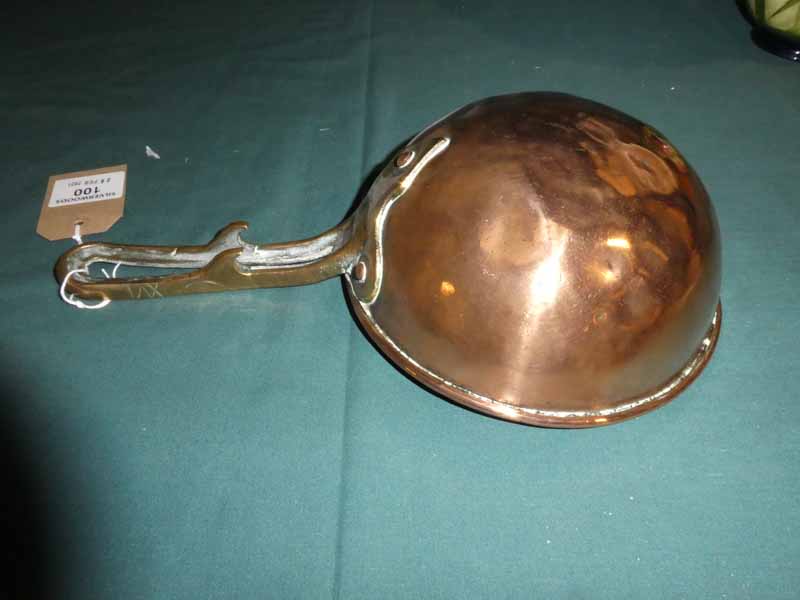 A 19th century copper Ladle, 20cm diameter with cast brass handle