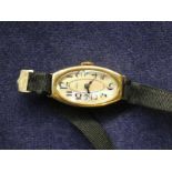 A ladies early 20th century Art Deco 18ct gold cased wrist watch, signed Arva to the mother of pearl