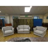 A modern Knoll style Three Piece Suite, two seater settee and a pair of large easy chairs in grey