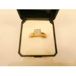 A 9ct seven stone illusion set diamond cluster ring size P 1/2, 4.4g