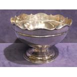 An Edwardian Silver Rose Bowl, circular form with reeded band below the shaped rim, stepped circular