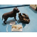 A Border of Fine Arts A1260 Staffordshire Bull Terrier standing and a cold cast model baby in hand