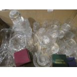 A box of assorted lead crystal glasses, decanters and vases
