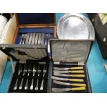 3 Cased sets of cutlery and oval stainless steel tray