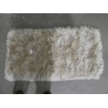 A Mohair Hearth Rug and one other