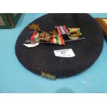 A Swing Mounted Medal Group of five inc 1939-45 Service and Defence Medals, Africa and Italy Star