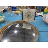 An Art Deco Onyx Mantle Clock and a Circular Convex Mirror in French Deco frame