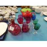 Nine items of coloured Glass inc Cranberry Decanter