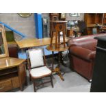 A mahogany octagonal Window Table on turned triform base, a Plant Stand and a Nursing Chair