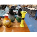 A pair of Scottish studio glass vases a trailed yellow glass vase and another