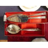 A Community Plate, boxed. Large Spoon, Fork and Salad Server, boxed. Cake slice and fish slice