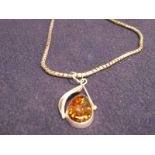 Amber Pendant with white metal Chain