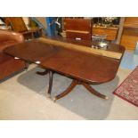 A Repro mahogany Regency style Draw Leaf Table on twin supports, 2 extra leaves