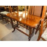 An Edwardian walnut aesthetics Side Table