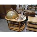 A Globe Cocktail Cabinet and a glass 4 branch Table Lamp