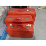 A graduated set of Crown Suitcases