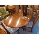An Old Charm oak extending Dining Table and 4 ladderback Chairs