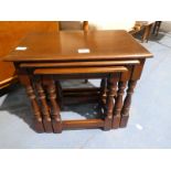 A reproduction oak Nest of 3 Tables