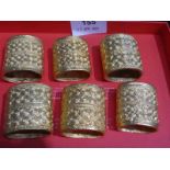 Six luxurious heavy gilded metal Napkin Rings