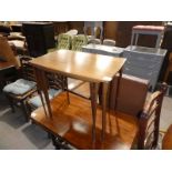 A 1950s teak nest of three Occasional Tables