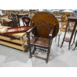 An oak circular tilt top Table/Bench Seat