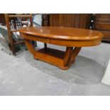 A modern Art Deco style oval Magazine Table