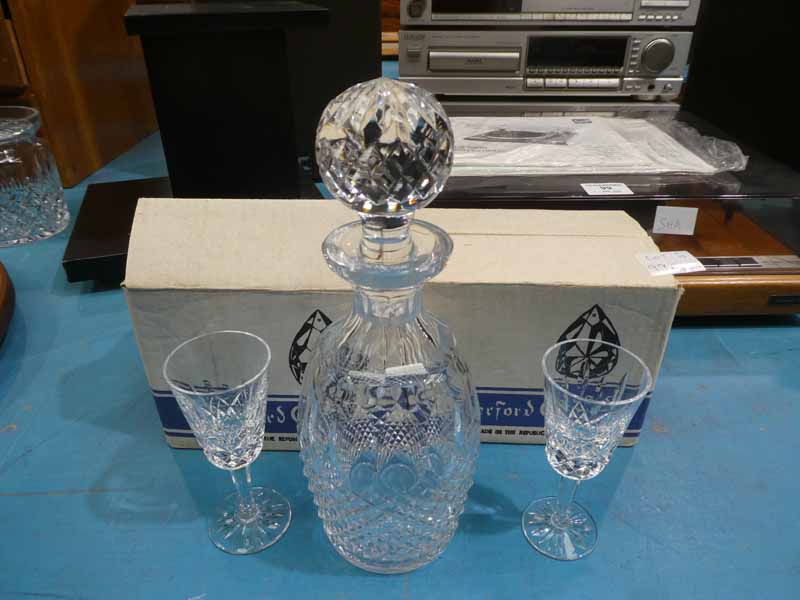 A Waterford Crystal Lismore Decanter and twelve matching Sherry Glasses