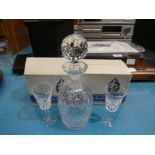 A Waterford Crystal Lismore Decanter and twelve matching Sherry Glasses